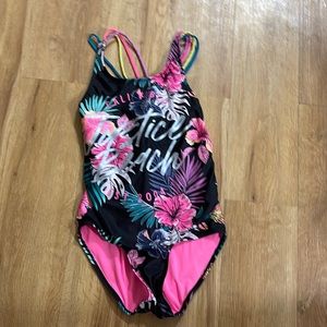 Large black justice bathing suit and its a little bit damaged on the bottom
